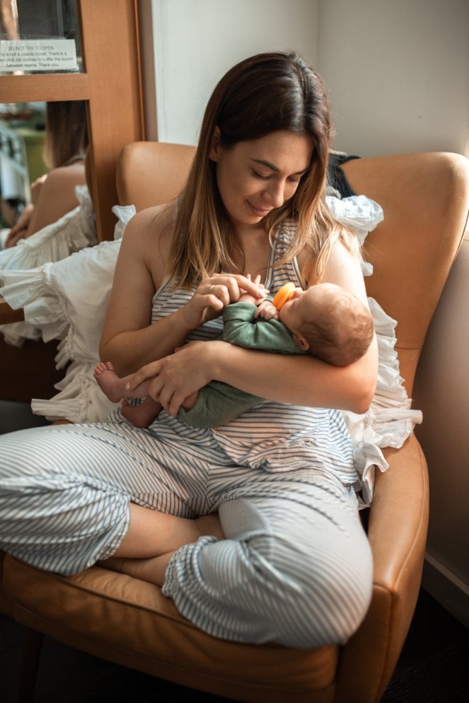 A mother holding her infant